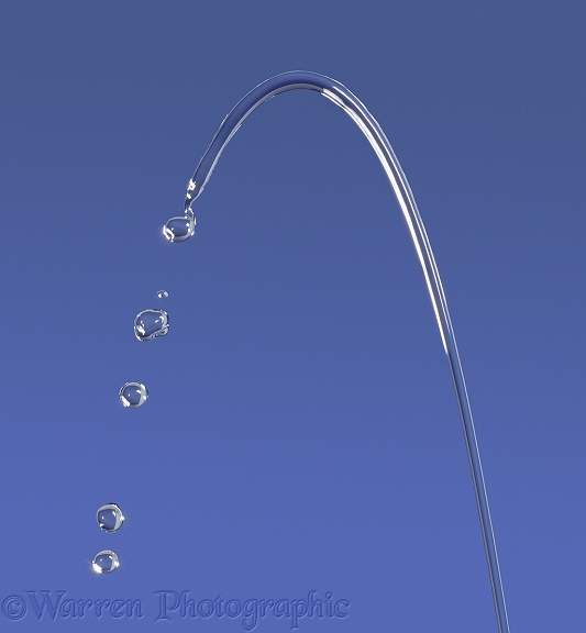 A jet of water eventually breaks into drops