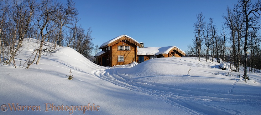 Wooden house with deep snow.  Geilo, Norway
