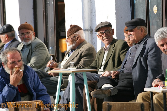 Turkish men drinking tea and smoking.  Kapadokia