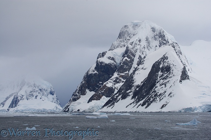 Snow and glacier clad mountains.  Antarctica