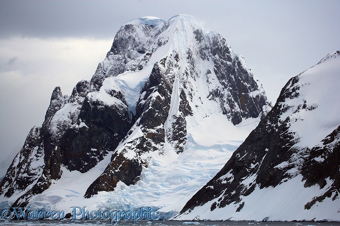 Snow and glacier clad mountains.  Antarctica