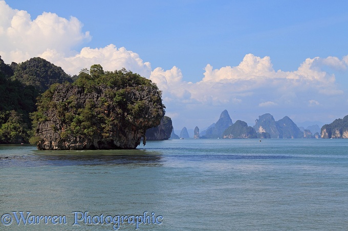 Limestone cliffs and pinnacle islands.  Phang Nga Bay, Thailand