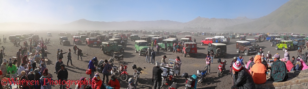 People and jeeps at Mt Bromo panorama.  Indonesia