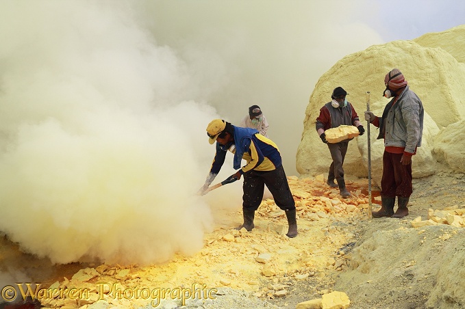 Men working the sulphur mine at Kawah Ijen.  Java, Indonesia