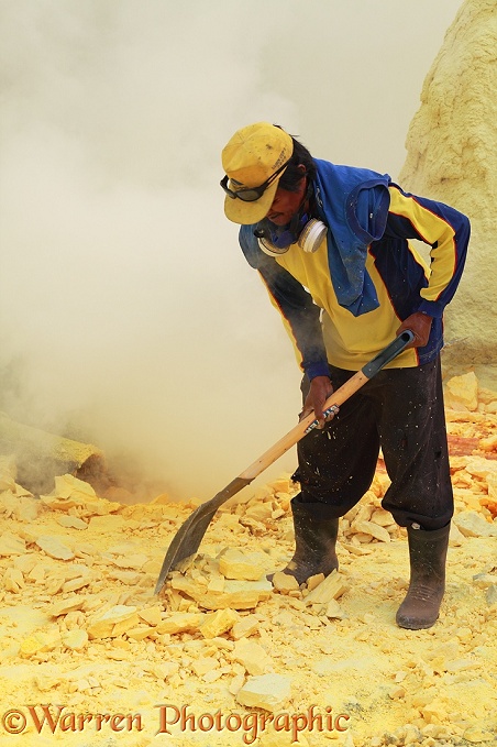 Men working the sulphur mine at Kawah Ijen.  Java, Indonesia