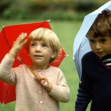 Mark & Hazel with little umbrellas