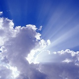 Blue sky and clouds with rays