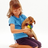 Girl with terrier-cross pup