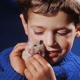 Boy with Golden Hamster