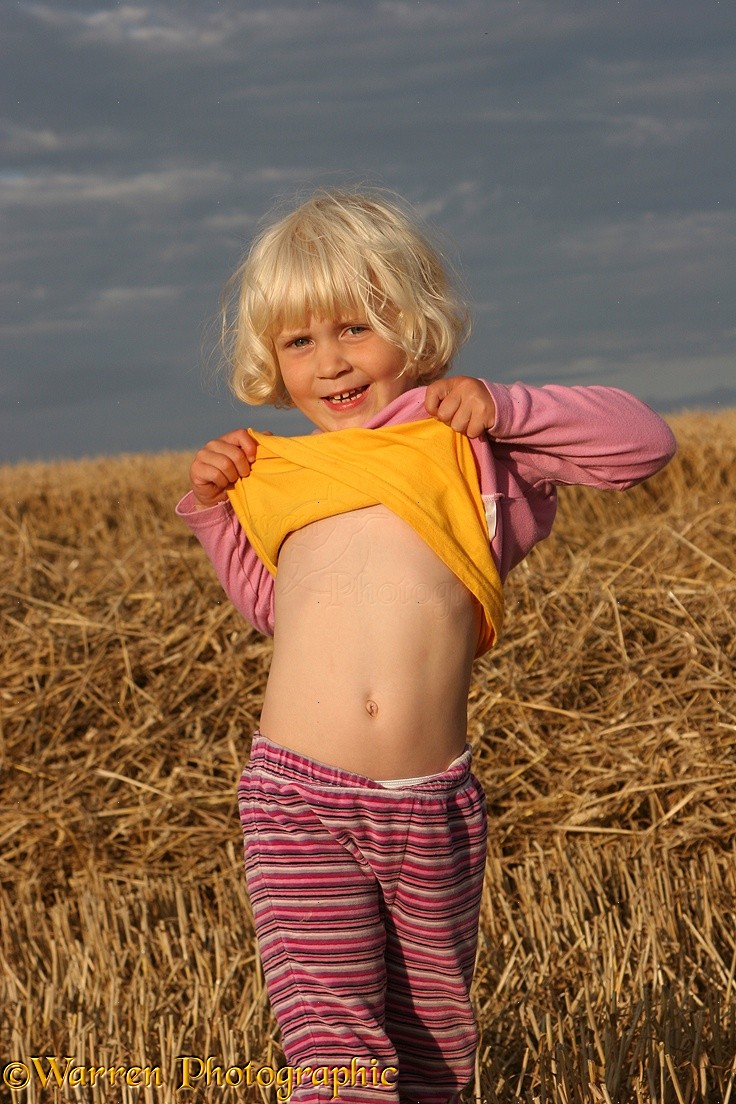 Little girl showing her tummy photo WP10092