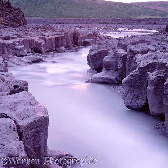 Rocky stream at sunrise.  Iceland