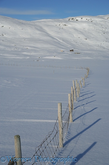 Fence buried in snow.  Geilo, Norway