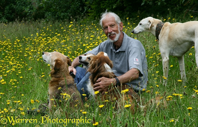 Photographer Kim Taylor with a collection of dogs