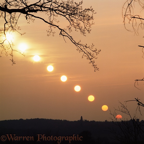 Setting sun at spring equinox, 52 degrees latitude.  Time lapse shot at 6 minute intervals.  Surrey, England