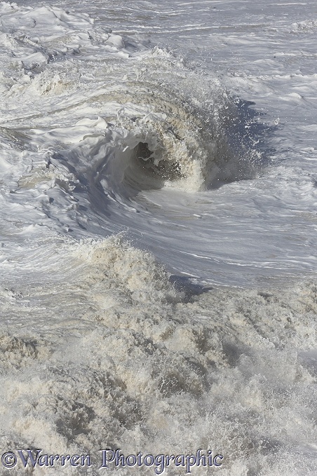 Foaming crashing wave at Birling Gap.  Sussex, England
