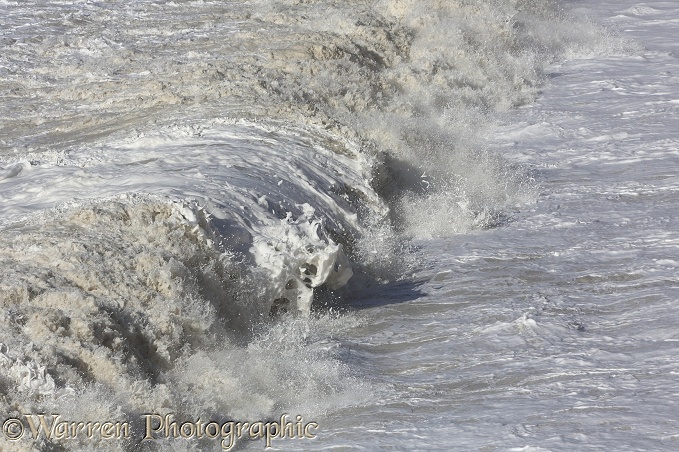 Foaming crashing wave at Birling Gap.  Sussex, England
