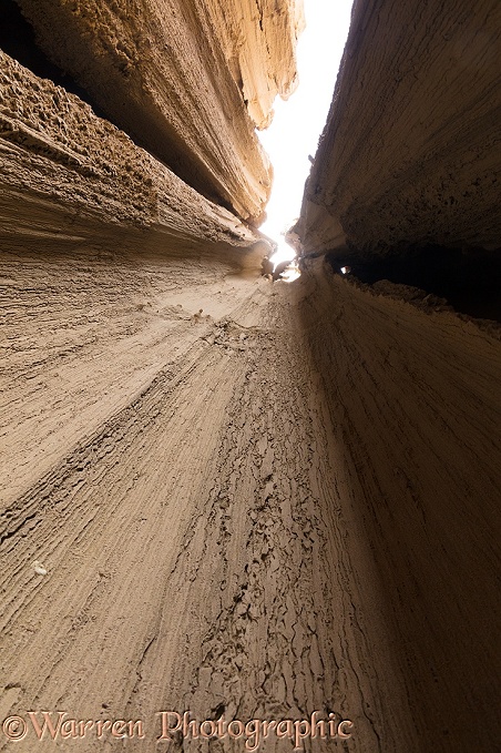 Looking up a shaft carved by rain in soft rock.  Ciudad del Encanto, Bolivia