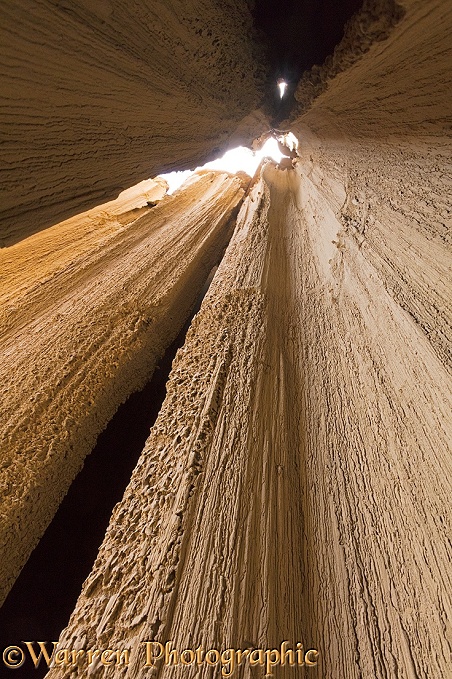 Looking up a shaft carved by rain in soft rock.  Ciudad del Encanto, Bolivia
