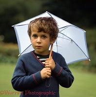Boy with little umbrella