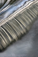 Water going over a small weir