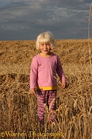 Little girl in wheat field