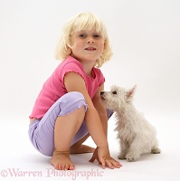 Little girl and Westie pup