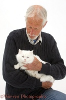 Man with poorly white cat