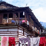Indian woman at window in Old Manali