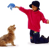 Girl with toy & dog