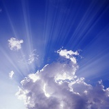 Blue sky and clouds with rays