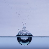 Water drop forming a bubble