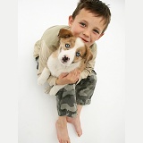Boy with Border Collie pup