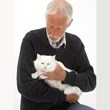 Man with poorly white cat