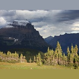 Trees, mountains and clouds