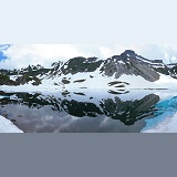 Lake and reflected mountains panorama
